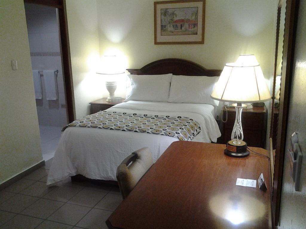Micro Hotel Condo Suites Santo Domingo Quarto foto