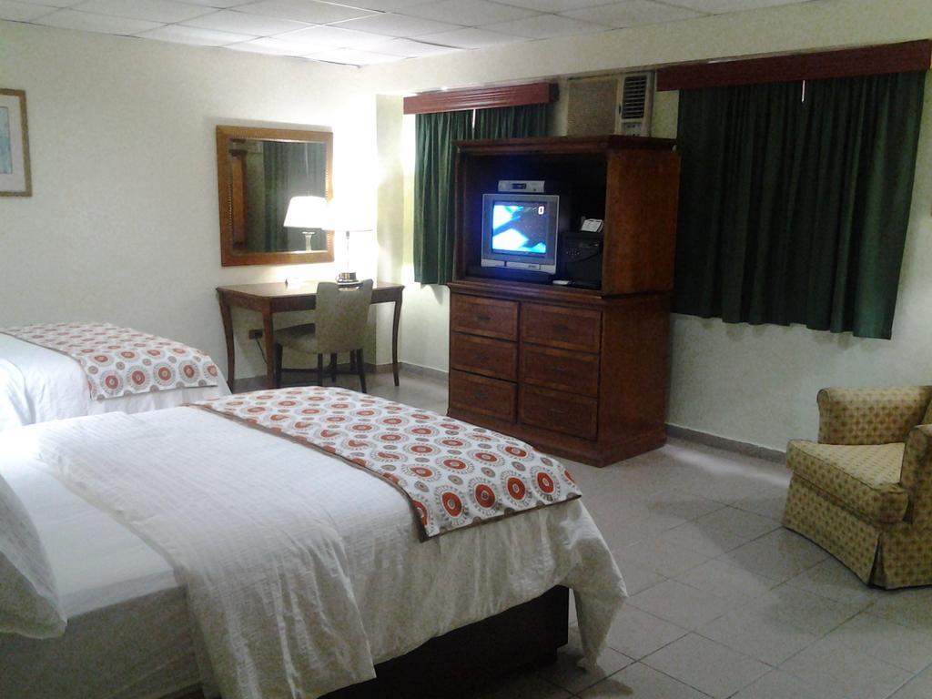 Micro Hotel Condo Suites Santo Domingo Quarto foto
